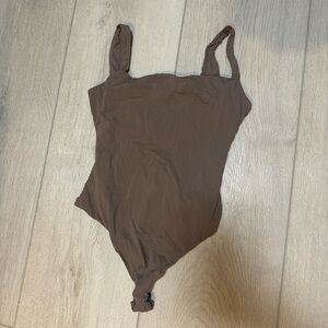 Skims square neck bodysuit in Sienna